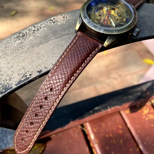 Badalassi Carlo Italian Leather Watch Strap | HEMSUT3 Burgundy leather watch strap close-up on a wristwatch