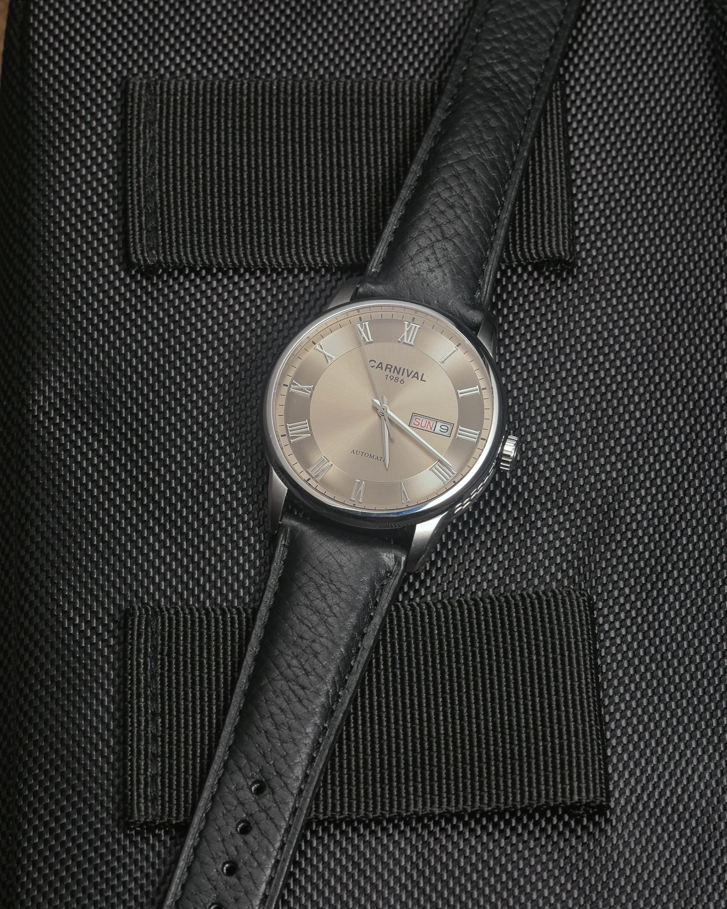 Black Italian leather watch strap installed on a wristwatch