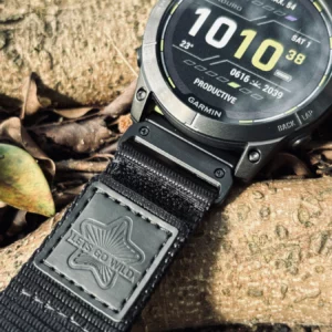 Close view of the black nylon band, HEMSUT patch and QuickFit connector on a Garmin watch