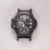 Front view of black adapter connectors installed on a G-SHOCK GA-1100 watch without a strap