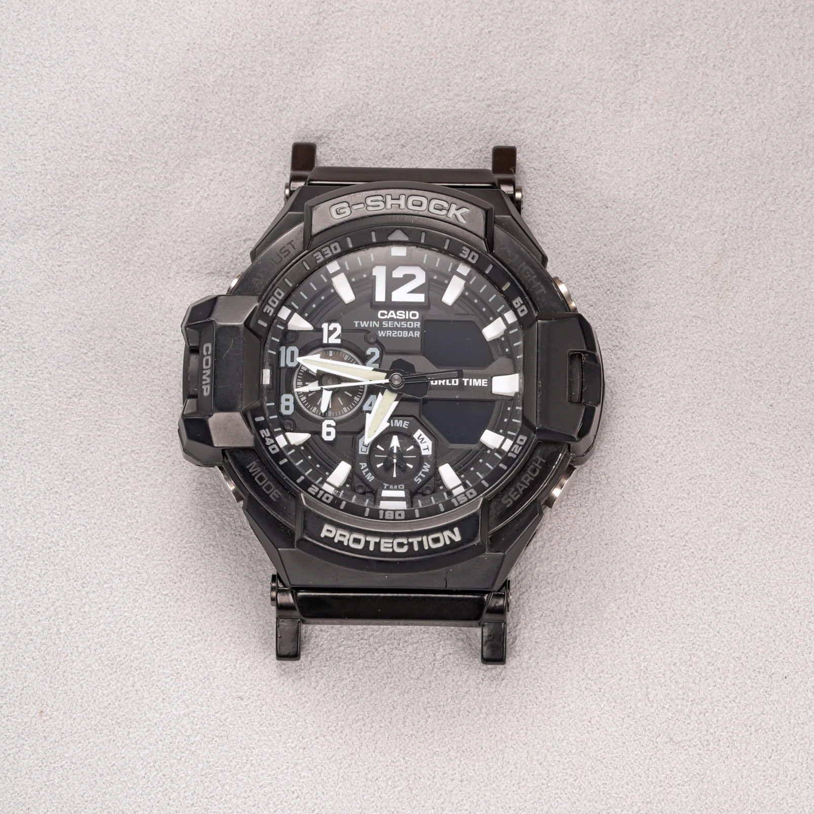 Black adapter connectors installed on a G-SHOCK GA-1100 watch without a strap