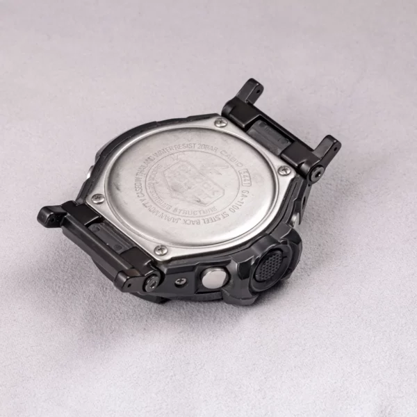 G-SHOCK GA-1100 caseback with black adapter connectors installed