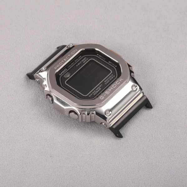 Detail view of black adapter connectors installed on a G-SHOCK GMW-B5000 watch without a strap