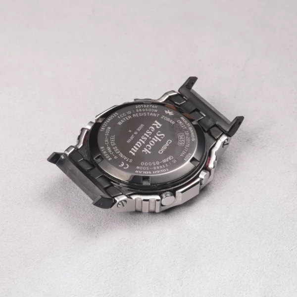 G-SHOCK GMW-B5000 caseback with black adapter connectors installed