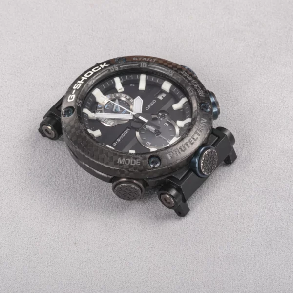 Detail view of black adapter connectors installed on a G-SHOCK GWR-B1000 watch without a strap