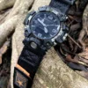 hg155-gwg2000-black-orange-01-forest-front Black Orange HEMSUT nylon watch band installed on a G-SHOCK GWG-2000 outdoors