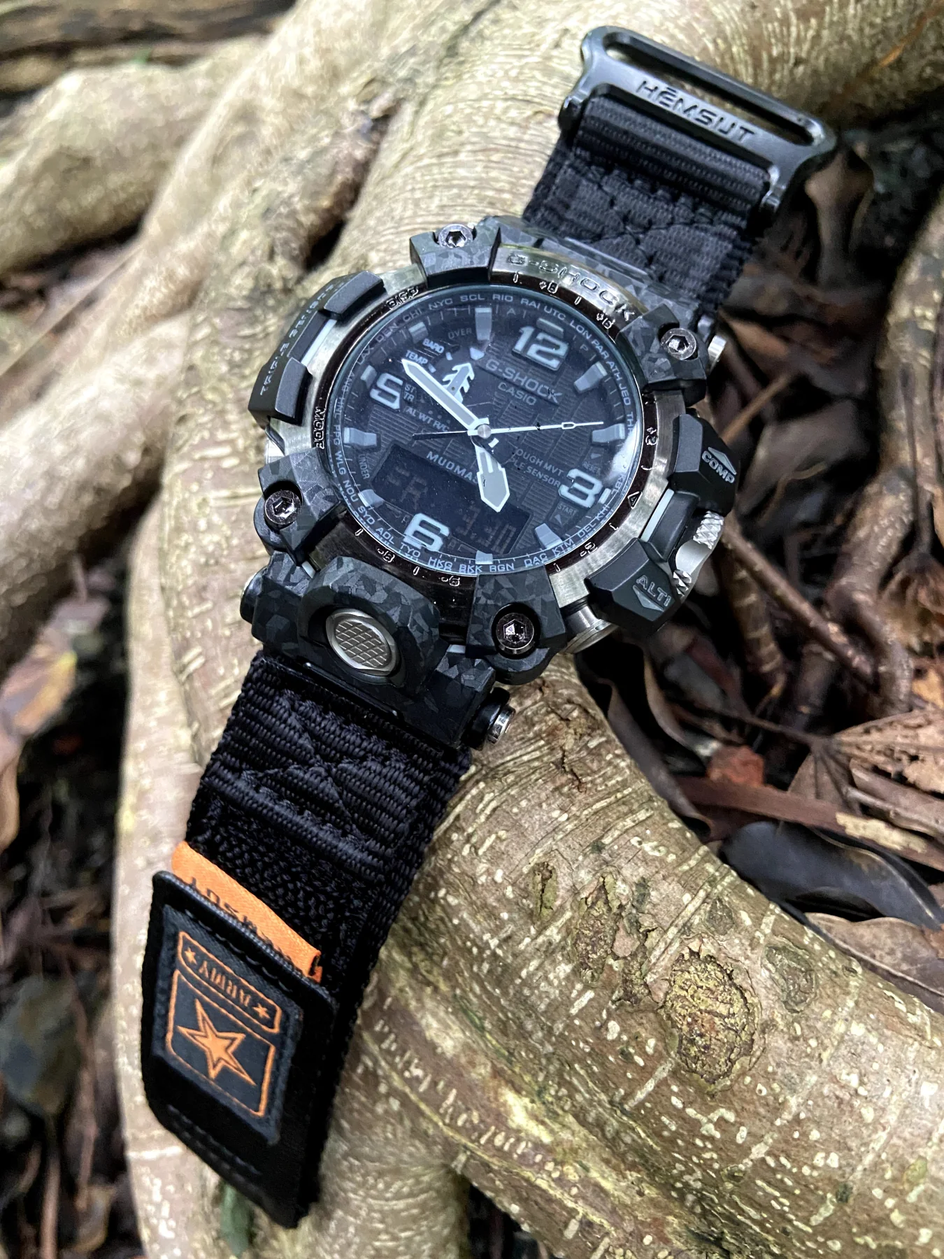 Black Orange HEMSUT nylon watch band installed on a G-SHOCK GWG-2000 outdoors