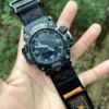 hg155-gwg2000-black-orange-04-hand-front Black Orange HEMSUT nylon Velcro-style watch band and G-SHOCK GWG-2000 held outdoors