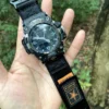hg155-gwg2000-black-orange-05-velcro-detail Black Orange star patch and hook-and-loop closure detail on the HEMSUT nylon watch band