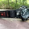 hg155-gwg2000-black-red-02-landscape-front Black Red nylon Velcro-style watch band fitted to a G-SHOCK GWG-2000 on an outdoor bench