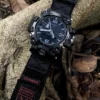 hg155-gwg2000-black-red-04-forest-display G-SHOCK GWG-2000 with Black Red HEMSUT nylon watch band displayed on tree roots