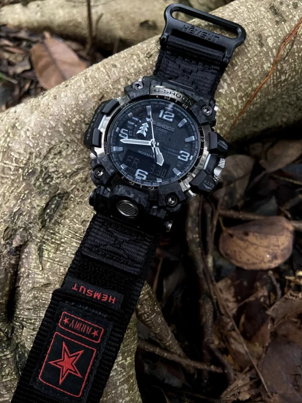 hg155-gwg2000-black-red-04-forest-display G-SHOCK GWG-2000 with Black Red HEMSUT nylon watch band displayed on tree roots
