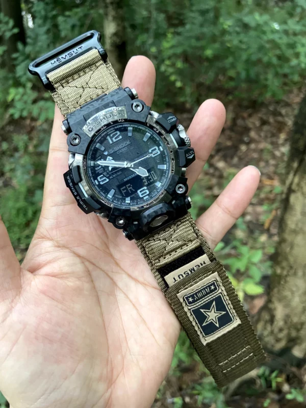hg155-gwg2000-coyote-01-hand-front Coyote HEMSUT nylon hook-and-loop watch band fitted to a G-SHOCK GWG-2000, held outdoors