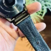 hga160-garmin-badalassi-carlo-black-leather-holes-detail Close view of the black Italian leather grain stitching and adjustment holes