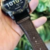 hga160-garmin-badalassi-carlo-burgundy-leather-grain-detail Close view of the burgundy Italian leather grain stitching and adjustment holes