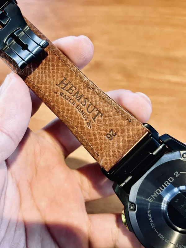 hga160-garmin-badalassi-carlo-cognac-brown-underside-logo Underside HEMSUT branding on the Cognac Brown leather Garmin strap